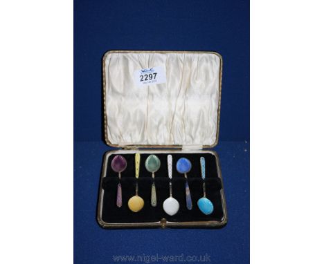 A cased set of six Silver and enamel Coffee Spoons.