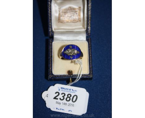 An unmarked Gold, enamel and Diamond Ring.