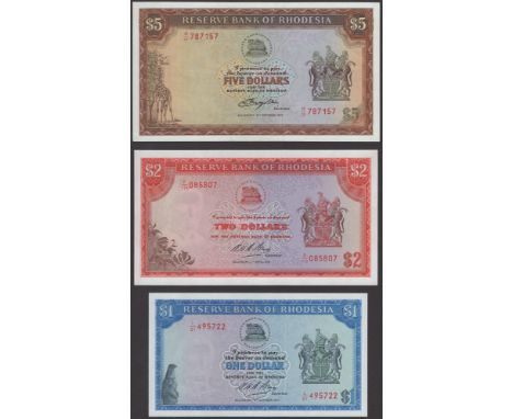 Reserve Bank of Rhodesia, $1, 19 October 1974, serial number L/91 495722, $2 (2), 7 April 1975, serial number K/119 085807 an