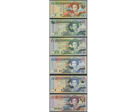 Eastern Caribbean Central Bank, a group comprising $1, $5 (2) and $10, ND (1988 issue), prefix-suffixes A-U, A-A, B-G and A-U