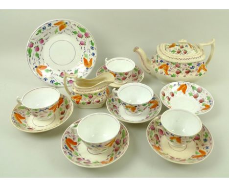 A late 19th century Sunderland lustre part tea service comprising tea pot, 24 by 11 by 14.5cm, creamer, five cups, six dished
