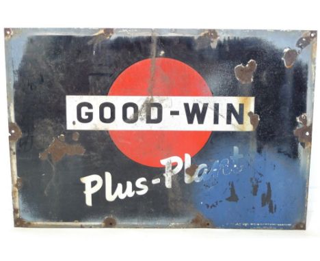 A vintage enamel sign for Good-Win, Plus-Plant, black background with central red circle and black and white lettering, 92 by