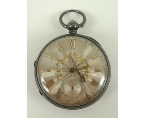 A Victorian silver open faced pocket watch, key wind, the silvered engraved face with applied Roman numerals and subsidiary d