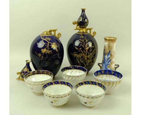 A pair of late 18th century Worcester tea bowls, the wrythen moulded bowls with blue and gilt harebell decoration and blue cr