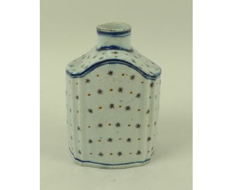 A Leeds pottery tea caddy, circa 1780, decorated in underglaze blue with line detail and overpainted with brown stars and dot