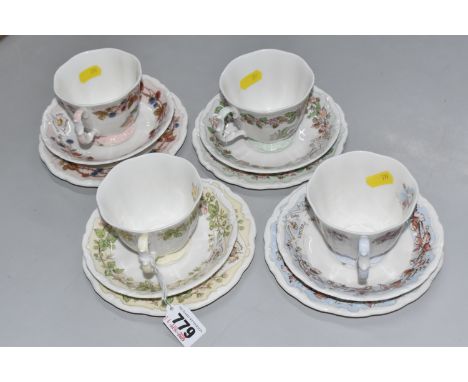 FOUR ROYAL DOULTON BRAMBLY HEDGE 'SEASONS' CUPS AND SAUCERS comprising a 'Spring,' 'Summer,' 'Autumn,' and a 'Winter' trio (h