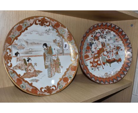 TWO JAPANESE MEIJI PERIOD KUTANI GILT CHARGERS comprising a charger with a central scene of three female figures and two chil