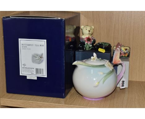 A BOXED FRANZ BUTTERFLY TEAPOT AND THREE TUPTONWARE ITEMS comprising a boxed Franz butterfly teapot designed by Jen Woo, heig