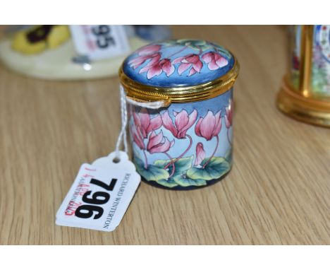 A MOORCROFT ENAMELED 'PURPLE CYCLAMEN' TRINKET POT with a brass rimmed hinged lid, and a single floral motif to the interior,