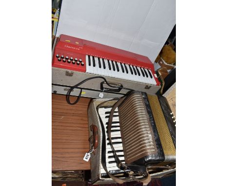 A VINTAGE ELECTRIC KEYBOARD AND A BELL PIANO ACCORDION comprising a Bell Piano Accordion with original travel case, serial nu