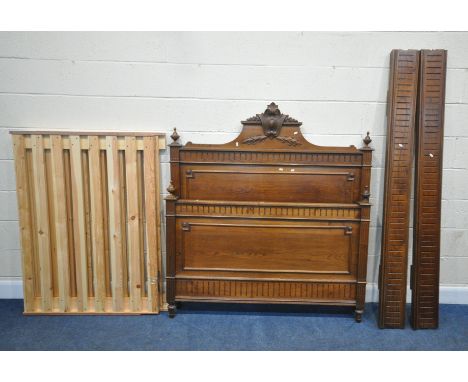 A 20TH CENTURY FRENCH OAK 4FT BEDSTEAD, with a scrolled and foliate crest, four finials, with side rails, slats and bolts, co