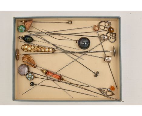 AN ASSORTMENT OF HAT PINS, to include a hat pin with a yellow metal orb with filigree detail, stamped 'M B &amp; Co' 9ct, two