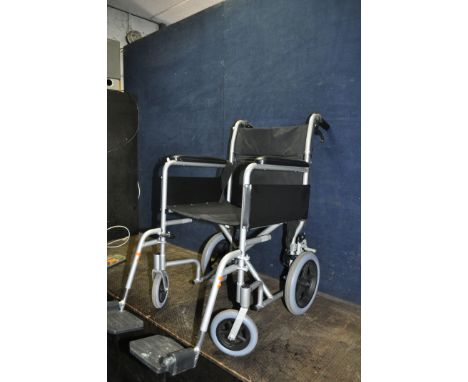 A DRIVE MOBILITY WHEELCHAIR, with two footrests