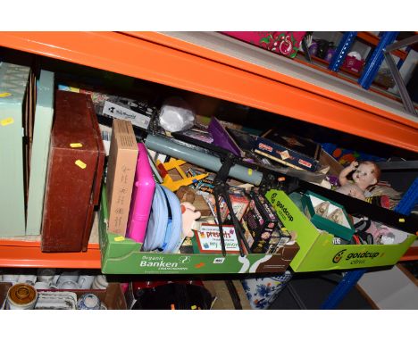 FOUR BOXES AND LOOSE TOYS, GAMES, CDS AND DVDS, to include a 1950's Pedigree baby doll, five sealed Wasgij 'Destiny Puzzles',