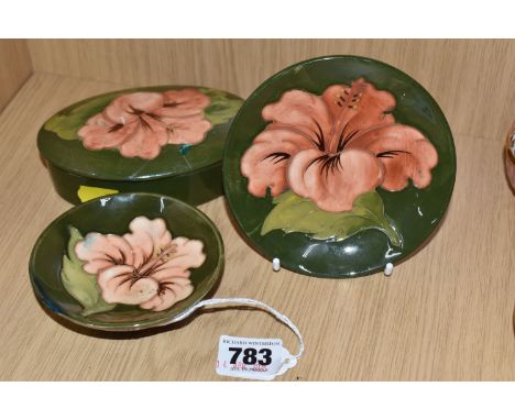 THREE MOORCROFT 'CORAL HIBISCUS' ITEMS comprising a  trinket dish diameter 12cm (multiple cracks, signs of repair), an oval l
