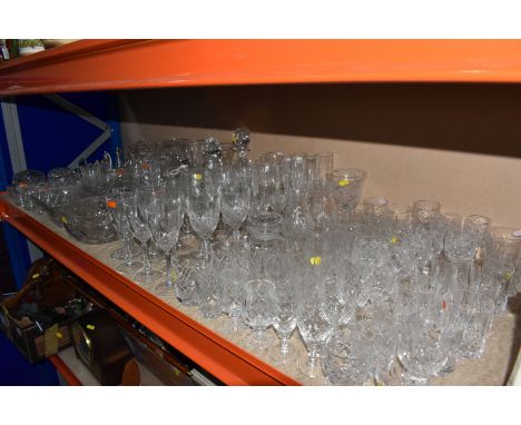 A LARGE COLLECTION OF CRYSTAL CUT GLASSWARE to include two decanters one marked Tutbury Crystal, four bowls to include a Dart