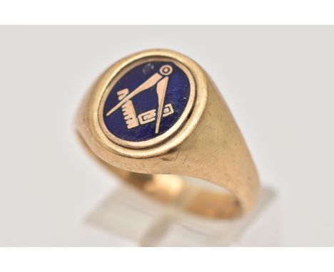 A GENTS 9CT GOLD MASONIC SIGNET RING, yellow gold signet ring with oval blue enamel detail, hallmarked 9ct Birmingham, ring s
