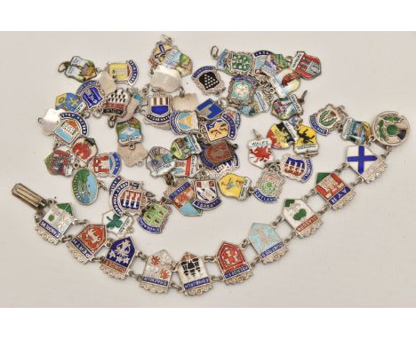 A SILVER AND ENAMEL SHEILD BRACELET AND ASSORTED WHITE METAL SHEILD CHARMS, bracelet hallmarked Birmingham, length 200mm, app