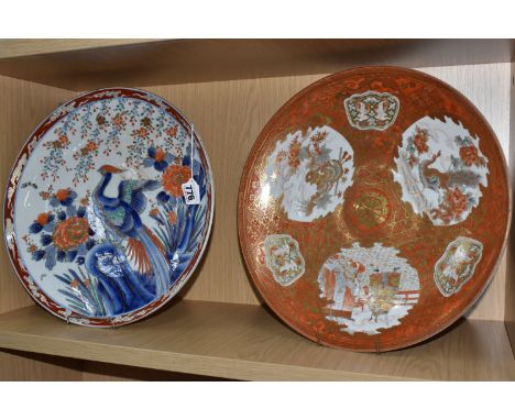 TWO MEIJI PERIOD JAPANESE CHARGERS comprising a red and gilt Kutani charger with three medallions depicting  birds, samurai, 