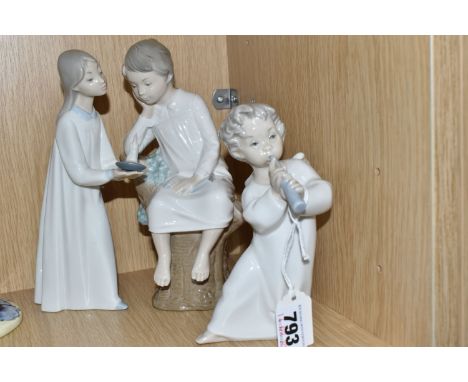 THREE LLADRO FIGURINES comprising 'The Thinker Boy' No. 4876 designed by Jose Roig, issued between 1974 and 1994, 'Girl with 