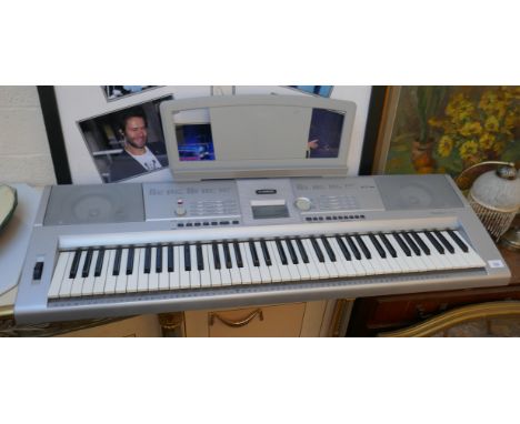 Yamaha Portable Grand keyboard model DGX-205 