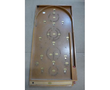 A vintage Chad Valley bagatelle board 