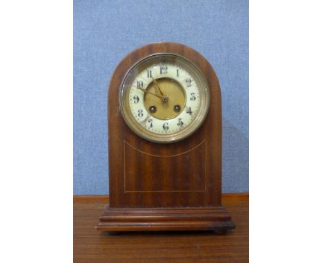 An early 20th Century inlaid mahogany mantel clock 
