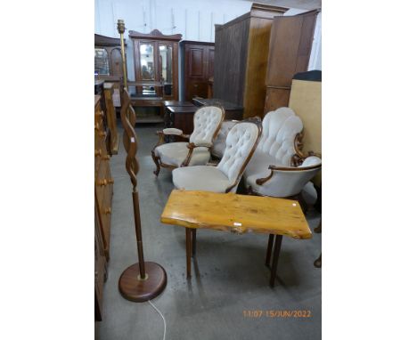 A teak standard lamp and a rootwood coffee table 