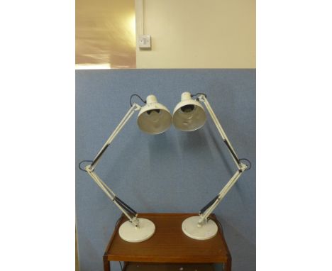 A pair of cast iron based white metal anglepoise desk lamps 