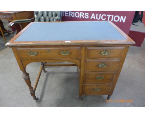 A Victorian Shapland &amp; Petter oak desk 