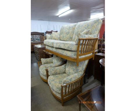 An Ercol Golden Dawn elm Renaissance three piece suite 