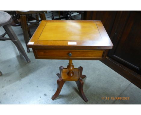 An inlaid yew wood single drawer lamp table 