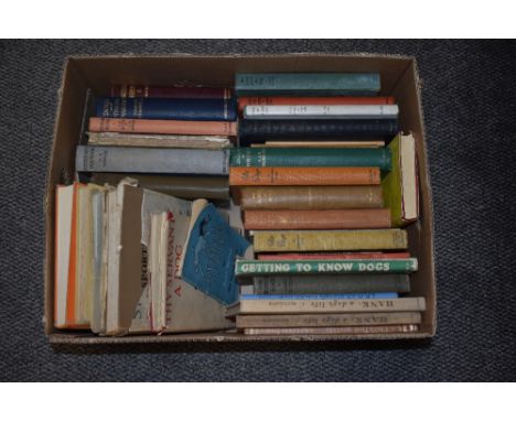 A collection of vintage dog books including getting to know dogs,sir Walters dogs,Thy servant dog and more.