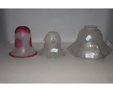 A group of three glass lamp shades
Condition: The large shade with minor nibbles to the smaller rim.