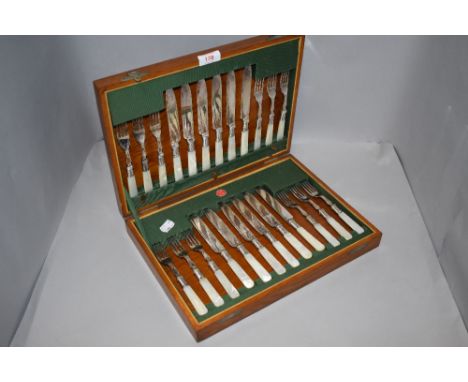 A late Edwardian mother of pearl handled fish knife and fork set
no damage or repairs visible