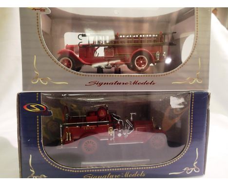 Two signature models 1/43 scale fire engines 1928 Reo fire truck and 1921 American La France fire pumper, both in excellent c