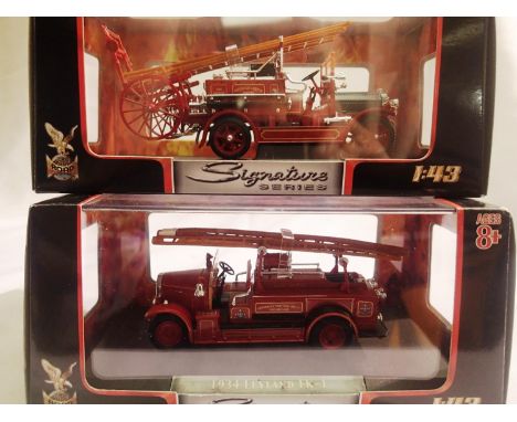 Two signature models 1/43 scale fire engines 1934 Leyland FK-1 and 1921 Denms N type, both in excellent condition, boxed. P&a