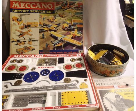 Meccano airport services set, contents very good, few parts missing, box is fair. Plus build books, and extra parts. P&amp;P 