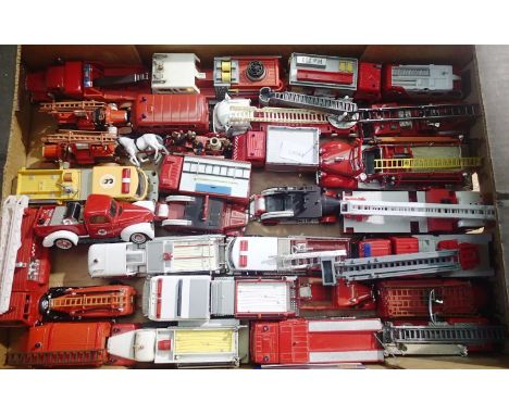 Approximately thirty plus fire engines, plastic and metal, various makes and scales, mostly good, unboxed. P&amp;P Group 2 (£