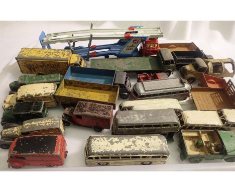 Twenty two Dinky Toys to include commercials and buses, all playworn, suitable for re-furbishment, plus Corgi Toys Ford car t