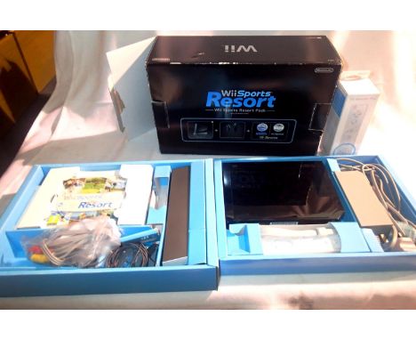 Boxed Wii sports resorts pack with spare Wii remote. P&amp;P Group 3 (£25+VAT for the first lot and £5+VAT for subsequent lot
