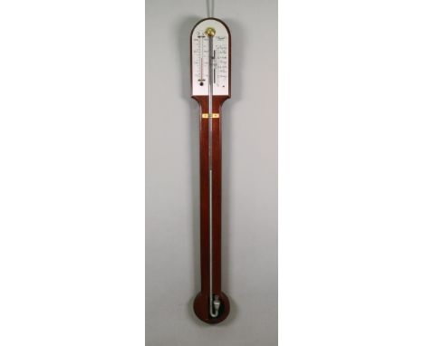 Russell Norwich: a reproduction mahogany stick barometer thermometer, with silvered scale, 91cm high.
