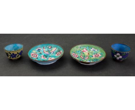Two Canton enamel famille rose miniature dishes, 19th century, each decorated with a butterfly, fruit and flowers against a b