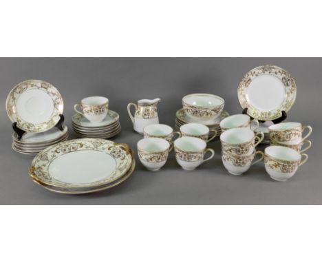 A Noritake gilt foliate bordered 40-piece tea service.