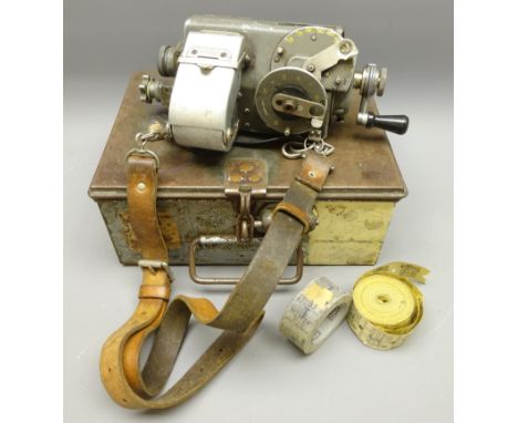 Bus Conductors ticket machine, twin dials with turn handle, No.0975 with leather strap and metal case with two rolls of South