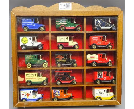 Collection of fifteen Lledo 1/76 scale diecast model vans in display cabinet   Condition Report  Mint models, Cabinet repaire