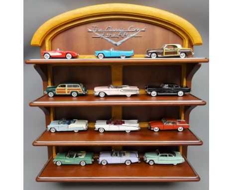 Set of twelve Franklin Mint 'Classic Cars of the Fifties' 1:24 scale diecast models, with display case and certificates,    C