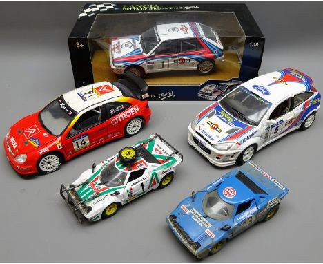 Rally 1:18 scale diecast models: Ricko Lancia Delta HF integrale Evo 2, boxed, Soildo Citroen Xsara WRC, Burago Ford Focus, 1