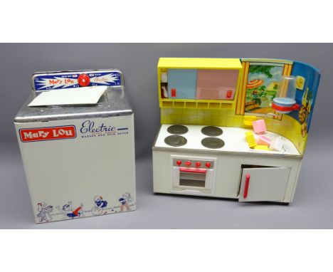 Vintage Chad Valley electric washing machine and a 1950's Fuchs German play set, both with the original boxes (2)   Condition