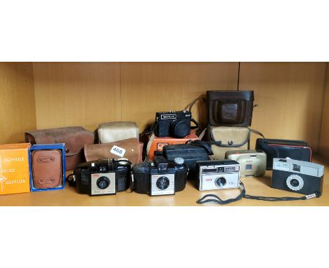 A quantity of vintage cameras.
